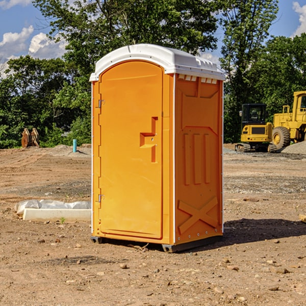 how often are the portable restrooms cleaned and serviced during a rental period in Devils Elbow